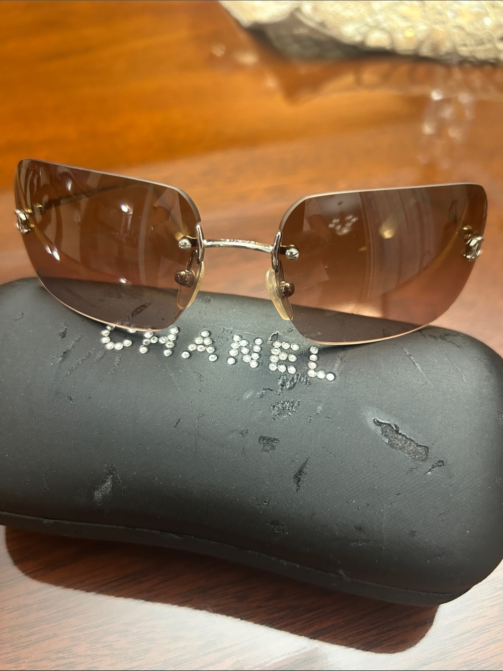 CHANEL Brown Rimless Sunglasses with Gold Accents